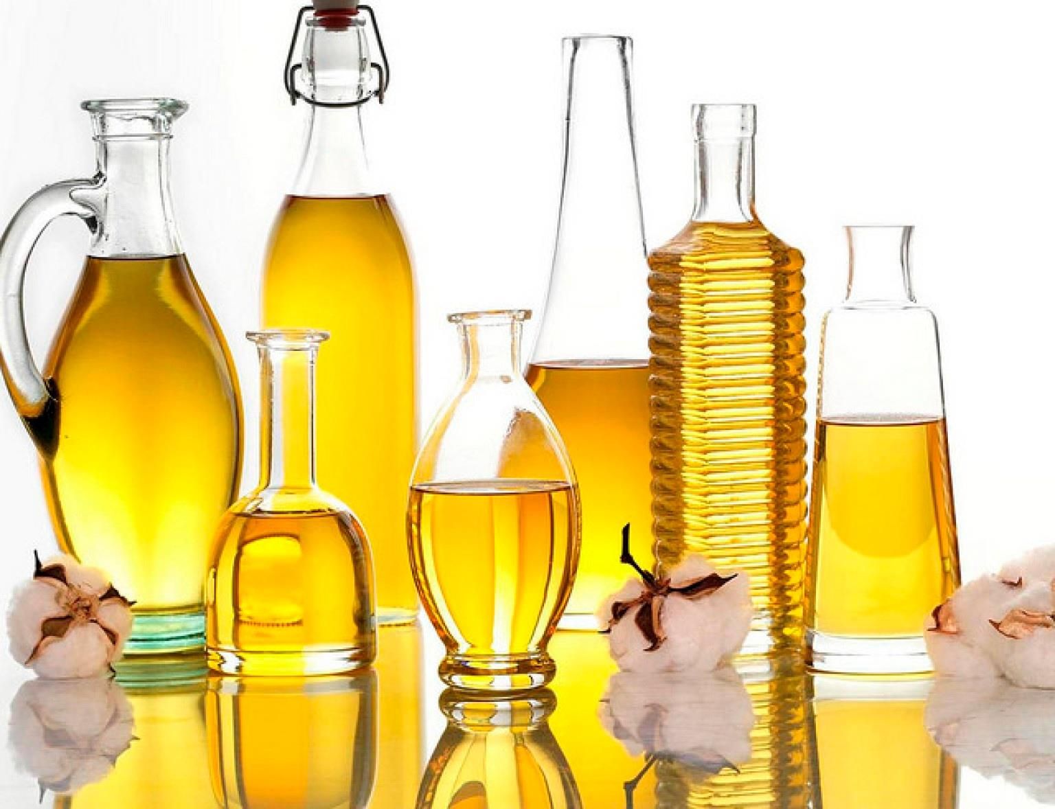 Premium vegetable oils and exotic fats in glass bottles